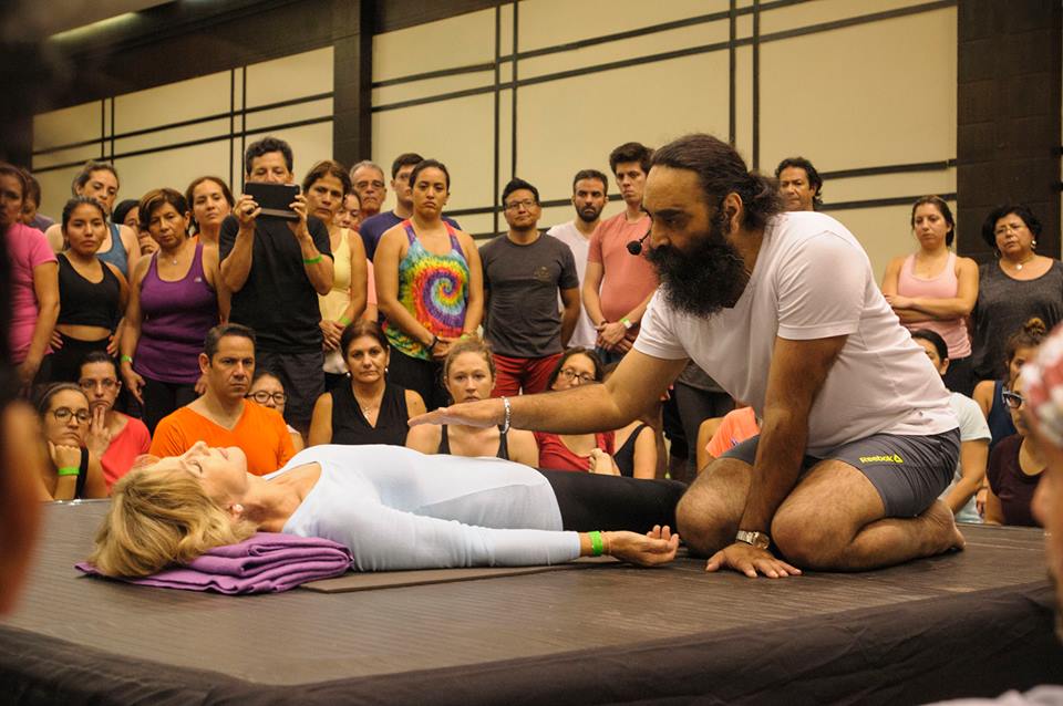 Surinder Singh conducts a yoga class at a yoga conference